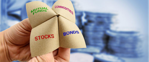 stock-photo-man-uses-a-paper-fortune-teller-to-make-multiple-decisions-for-his-own-portfolio-allocating-assets-553441573